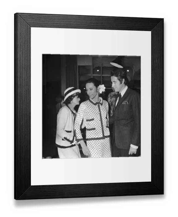 Framed Print : Coco Chanel Standing with Guests Framed Print : Coco Chanel Standing with Guests