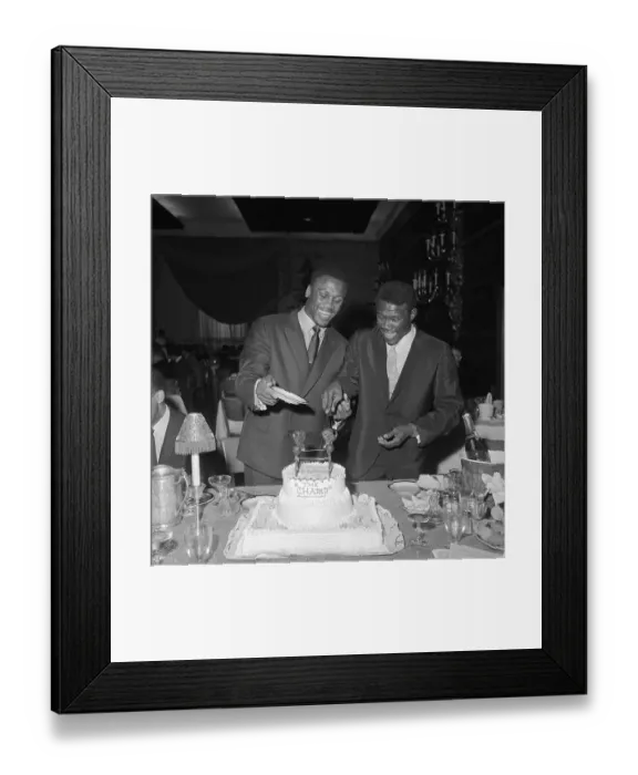 Framed Print : Emile Griffith Cutting Cake for Joe Frazier Framed Print : Emile Griffith Cutting Cake for Joe Frazier