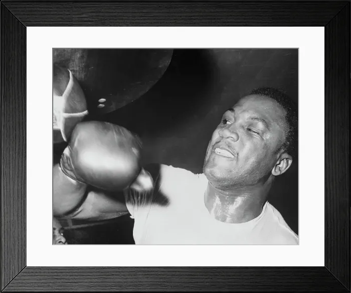 Framed Print : Joe Frazier Working Out with Punching Bag Framed Print : Joe Frazier Working Out with Punching Bag