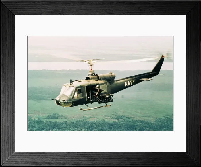 Framed Print : American Gunners Firing from Helicopter in Vietnam