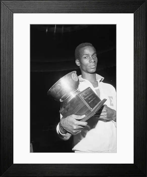 Framed Print : 3 / 4 Of Robert Beamon Holding Trophy Framed Print : 3 / 4 Of Robert Beamon Holding Trophy