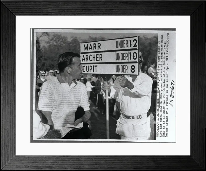 Framed Print : Dave Marr Looking at Scores Framed Print : Dave Marr Looking at Scores