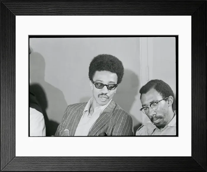 Framed Print : H. Rap Brown Speaking to a Colleague Framed Print : H. Rap Brown Speaking to a Colleague