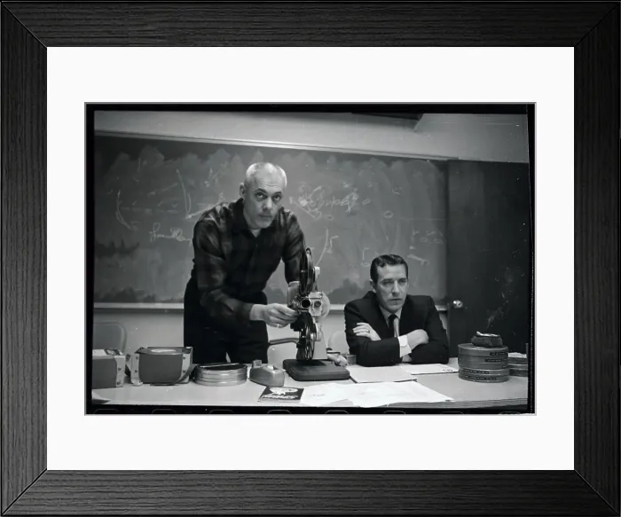 Framed Print : Coach Adjusting Film Projector Framed Print : Coach Adjusting Film Projector