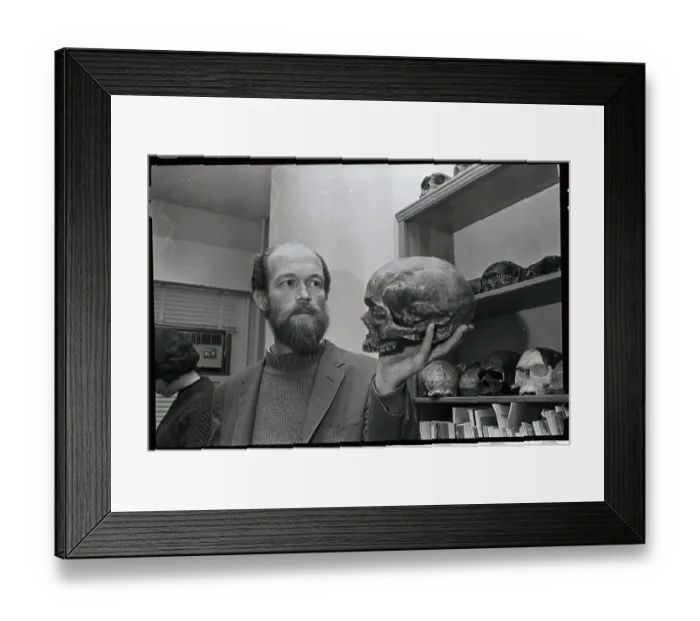 Framed Print : Professor Holding Skull Framed Print : Professor Holding Skull