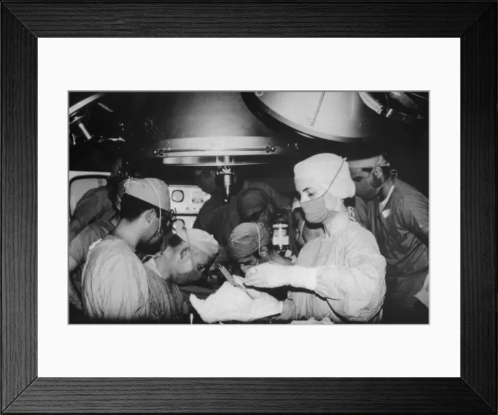 Framed Print : Doctors Performing Surgery Framed Print : Doctors Performing Surgery