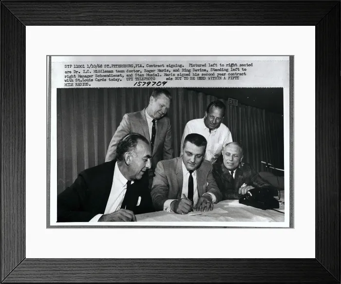 Framed Print : Team players Signing Contract Framed Print : Team players Signing Contract