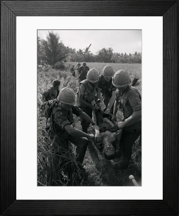 Framed Print : Vietnam Casualty Carried by His Comrades Framed Print : Vietnam Casualty Carried by His Comrades