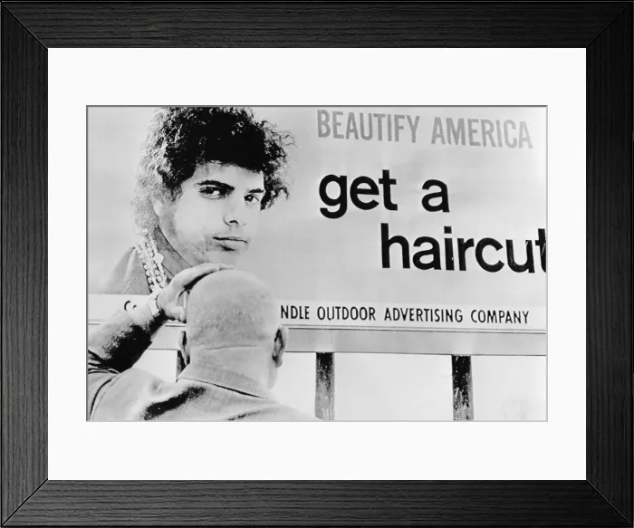 Framed Print : Man Looking at Large Sign