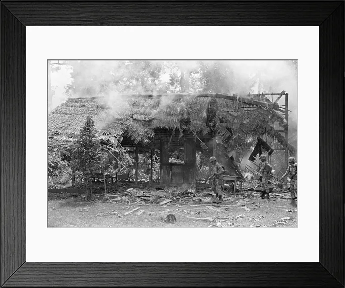 Framed Print : Indonesian Soldiers Check Burning House Framed Print : Indonesian Soldiers Check Burning House