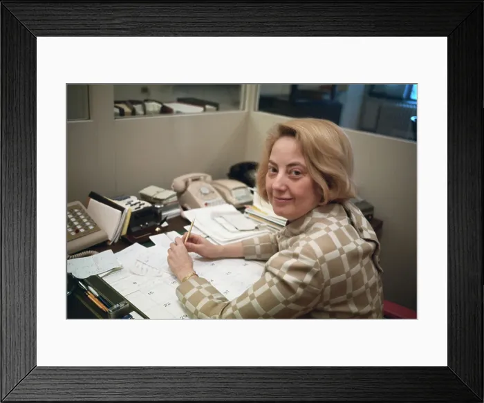 Framed Print : Muriel Siebert Working at her Desk