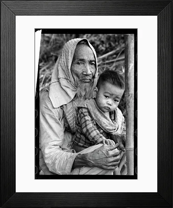 Framed Print : Elderly Man and Boy in War-Torn Vietnam Framed Print : Elderly Man and Boy in War-Torn Vietnam