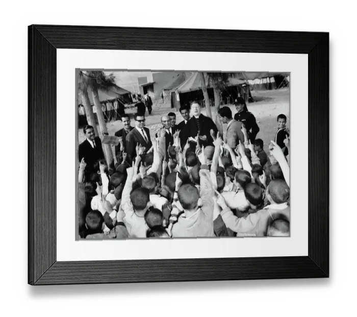 Framed Print : Monsignor John Roudan Surrounded by Young People Framed Print : Monsignor John Roudan Surrounded by Young People