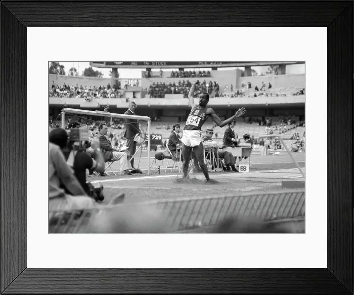 Framed Print : Robert Beamon Landing Triple Jump Framed Print : Robert Beamon Landing Triple Jump