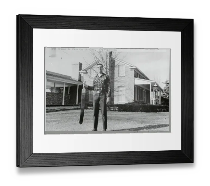Framed Print : Thomas C. Murton Holding a Strap Outside his Home Framed Print : Thomas C. Murton Holding a Strap Outside his Home