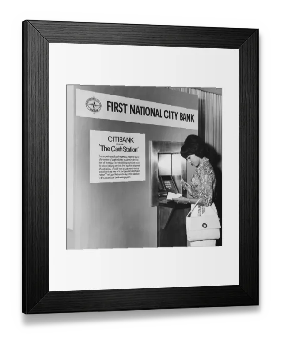 Framed Print : Woman Withdrawing Money from Cash Station Framed Print : Woman Withdrawing Money from Cash Station