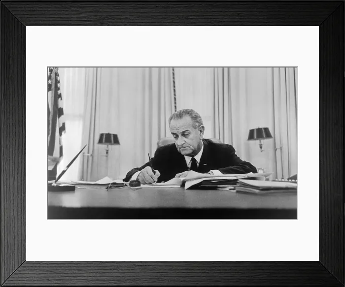 Framed Print : Lyndon Johnson Signing Paper at Desk Framed Print : Lyndon Johnson Signing Paper at Desk