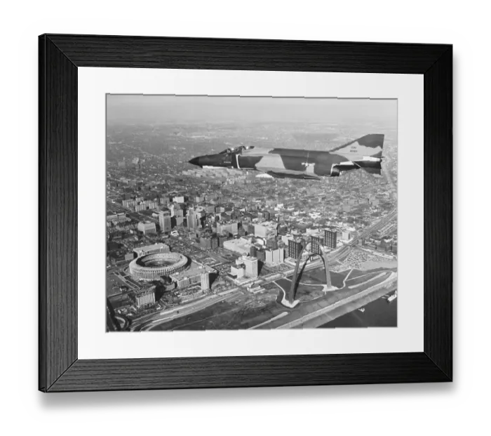 Framed Print : The McDonnell-Douglas F-4E Phantom Flies over St Louis Framed Print : The McDonnell-Douglas F-4E Phantom Flies over St Louis
