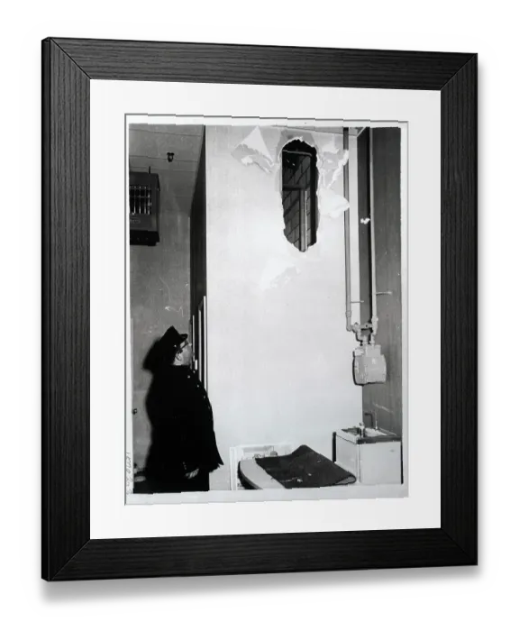 Framed Print : Police Officer Looking at Hole in Wall Framed Print : Police Officer Looking at Hole in Wall