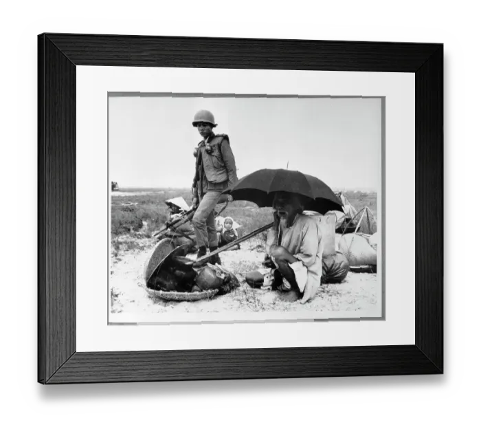 Framed Print : Elderly Vietnamese Man Sits Under Umbrella Framed Print : Elderly Vietnamese Man Sits Under Umbrella