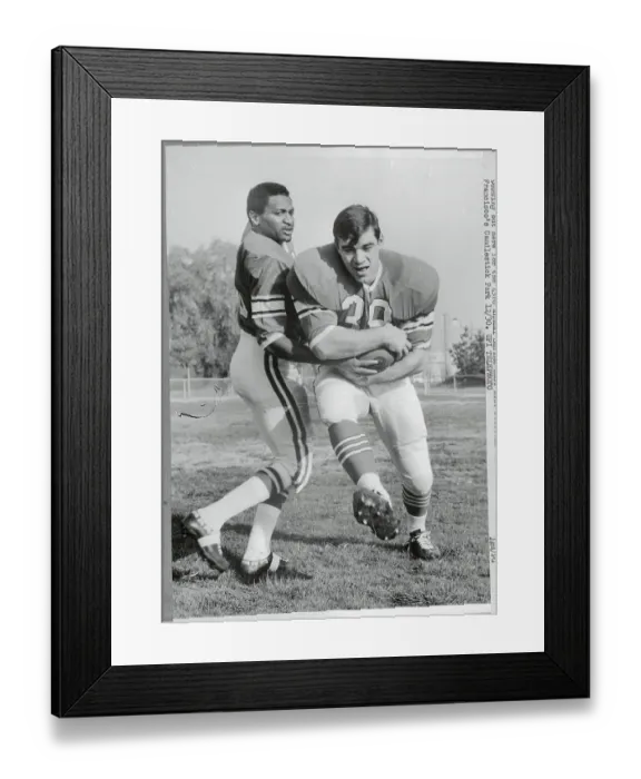 Framed Print : Football Players Practicing for Upcoming Game Framed Print : Football Players Practicing for Upcoming Game