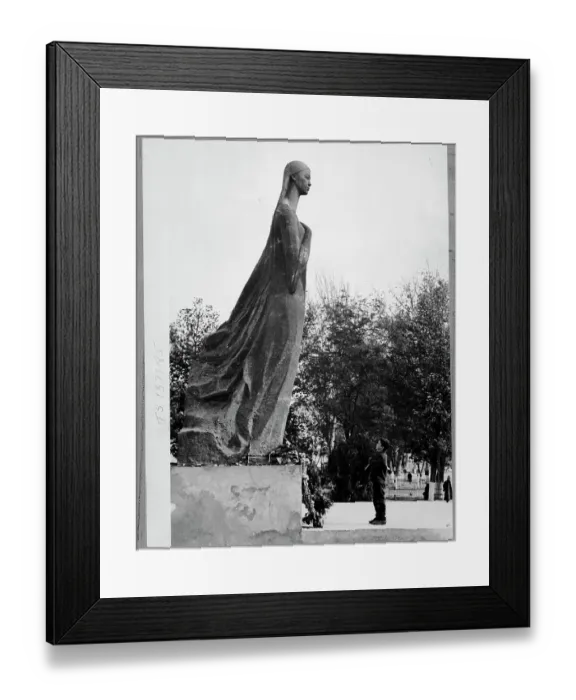 Framed Print : Boy Looks up at Statue of Nurkhon Yuldasheva Framed Print : Boy Looks up at Statue of Nurkhon Yuldasheva