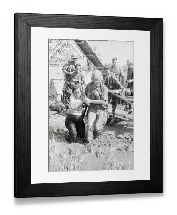 Framed Print : Wounded Vietnamese Evacuated by Soldier Framed Print : Wounded Vietnamese Evacuated by Soldier