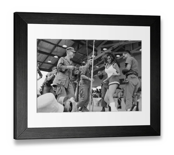 Framed Print : Raquel Welch Dancing with Soldiers Framed Print : Raquel Welch Dancing with Soldiers