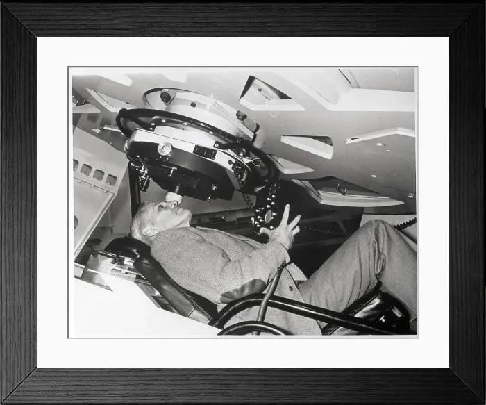 Framed Print : Man Seated Under Isaac Newton Telescope Framed Print : Man Seated Under Isaac Newton Telescope