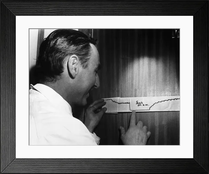 Framed Print : Doctor Cecil Moss Pointing at Electrocardiograph