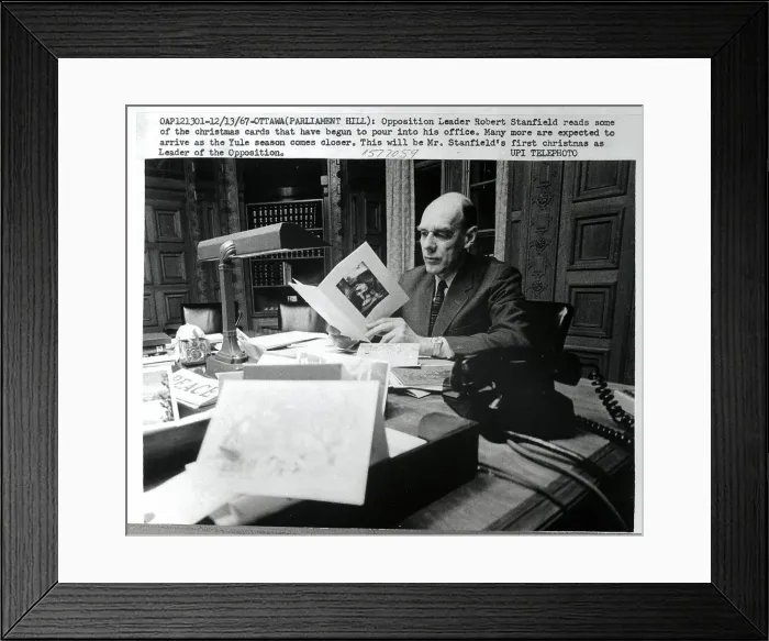 Framed Print : Robert Stanfield Reads Christmas Cards