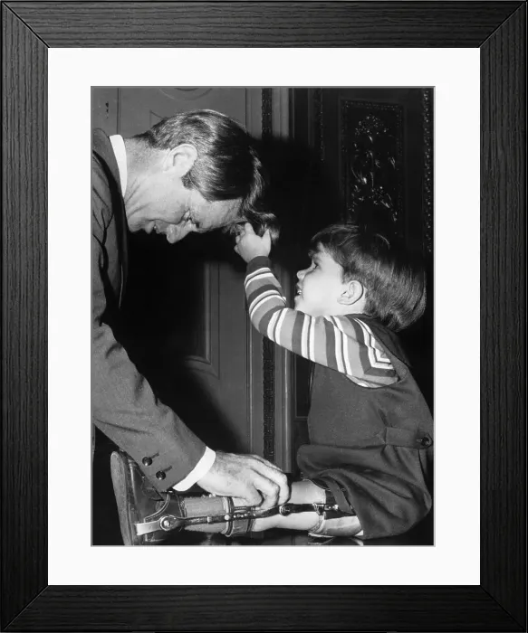 Framed Print : Robert Kennedy Playing with Child Framed Print : Robert Kennedy Playing with Child