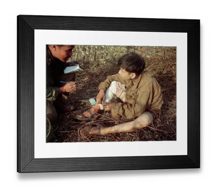 Framed Print : Soldier Talks to Vietcong Youth Framed Print : Soldier Talks to Vietcong Youth