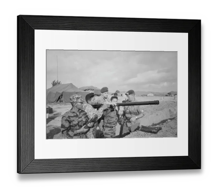 Framed Print : American Green Berets in Position for War on Terrain