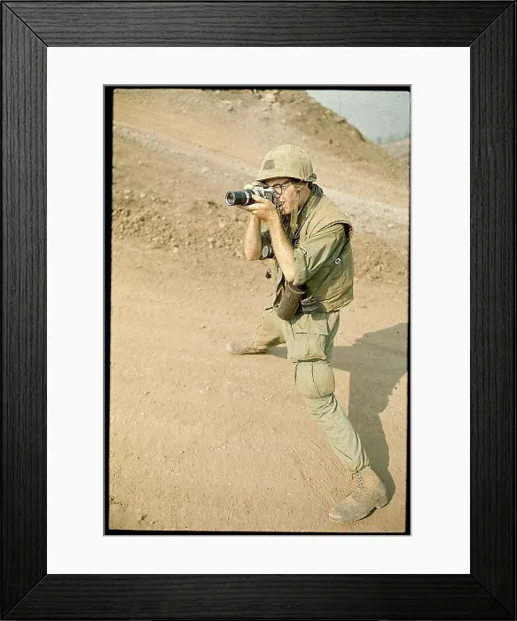 Framed Print : War Photographer Taking Picture Framed Print : War Photographer Taking Picture