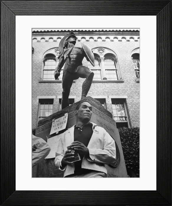 Framed Print : O.J. Simpson Stands Before Tommy Trojan Statue Framed Print : O.J. Simpson Stands Before Tommy Trojan Statue