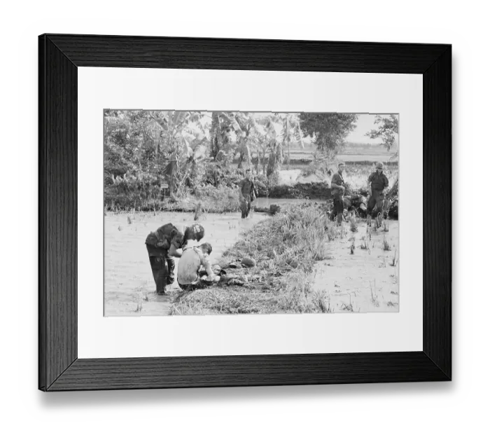 Framed Print : Soldier Helping to Remove Booby Traps Framed Print : Soldier Helping to Remove Booby Traps