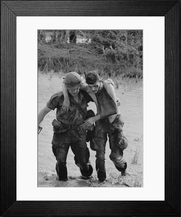 Framed Print : Soldier Helping Wounded Soldier to Safety Framed Print : Soldier Helping Wounded Soldier to Safety