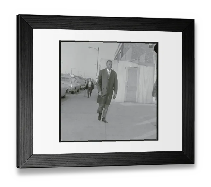 Framed Print : Richard Hatcher Strolling Down a Sidewalk