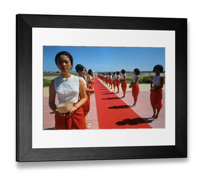 Framed Print : Women Standing Next to a Red Carpet Framed Print : Women Standing Next to a Red Carpet