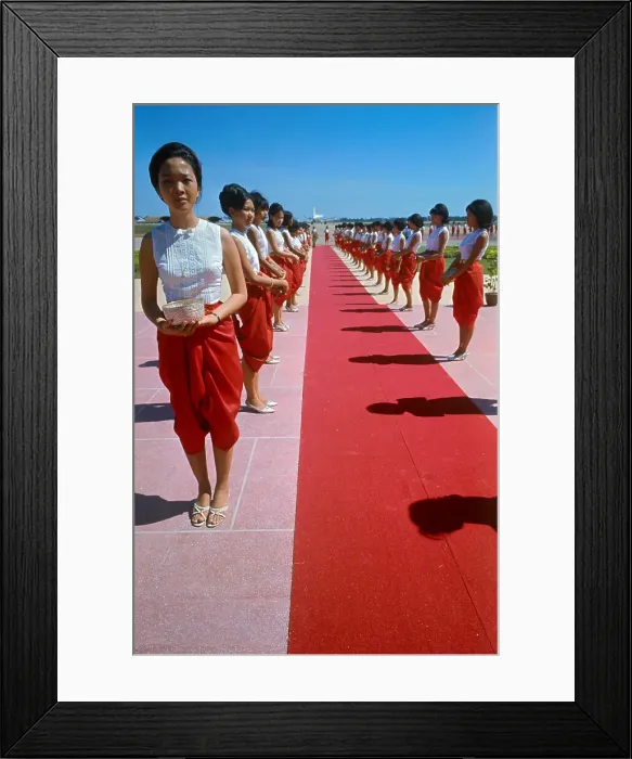 Framed Print : Women Standing Next to a Red Carpet Framed Print : Women Standing Next to a Red Carpet