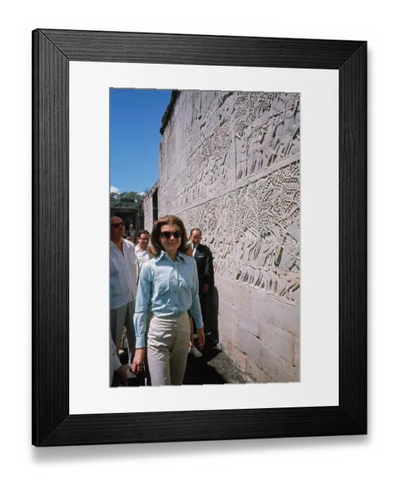 Framed Print : Jacqueline Kennedy Standing Next to an Ancient Wall Framed Print : Jacqueline Kennedy Standing Next to an Ancient Wall