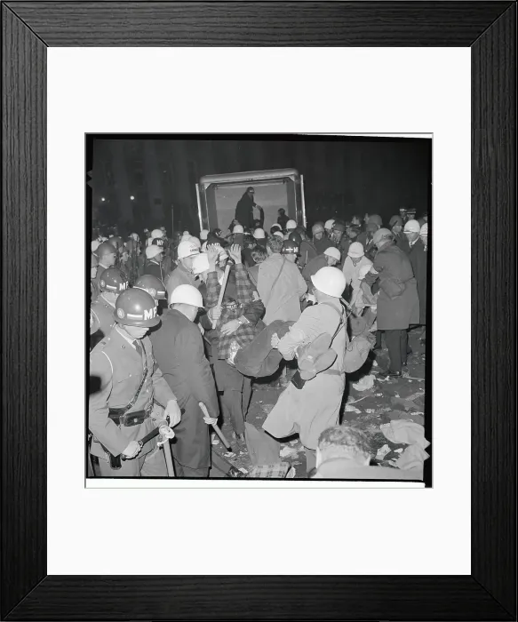 Framed Print : Demonstrator Being Carried to Van Framed Print : Demonstrator Being Carried to Van