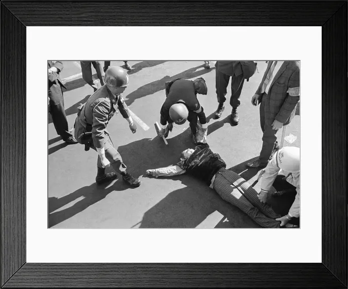 Framed Print : Security Picking up Prostrate Demonstrator Framed Print : Security Picking up Prostrate Demonstrator