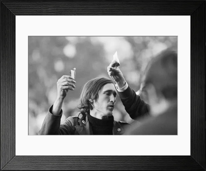 Framed Print : Youth Burning Draft Card at Protest