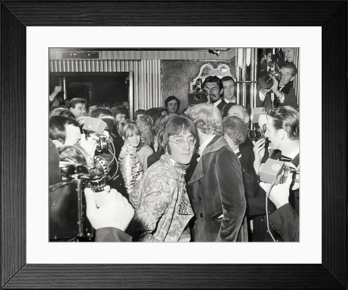 Framed Print : John Lennon Arriving at Theater with Wife Framed Print : John Lennon Arriving at Theater with Wife