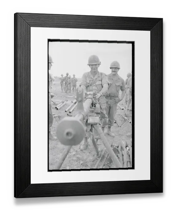 Framed Print : Officer Inspecting Captured Vietcong Machine Gun Framed Print : Officer Inspecting Captured Vietcong Machine Gun
