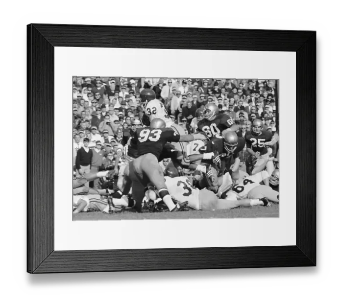 Framed Print : O.J. Simpson Goes Over the Notre Dame Defense Framed Print : O.J. Simpson Goes Over the Notre Dame Defense