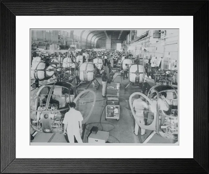 Framed Print : Workmen Assembling Helicopters Framed Print : Workmen Assembling Helicopters