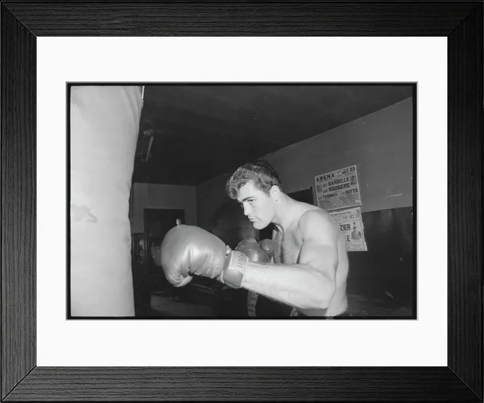 Framed Print : Tony Doyle Hitting a Punching Bag Framed Print : Tony Doyle Hitting a Punching Bag